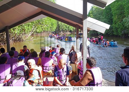 Chantaburi, Laem Sing, Thailand - 26 July 2019 Tourists Floating On Pvc Pipe Raft In The Lake Of Lae