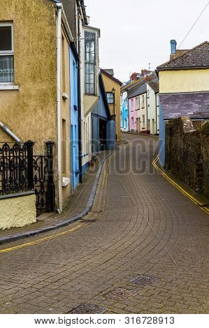 Street With Coloured Houses, In The United Kingdom, Portrait.