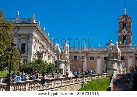 Rome, Italy - April, 2018: Tourists Visiting The Capitoline Hill And The Palazzo Senatorio