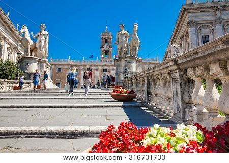 Rome, Italy - April, 2018: Tourists Visiting The Capitoline Hill And The Palazzo Senatorio
