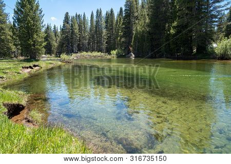 View Of The Clear Water In The Dana Fork River In Yosemite National Park On A Summer Day