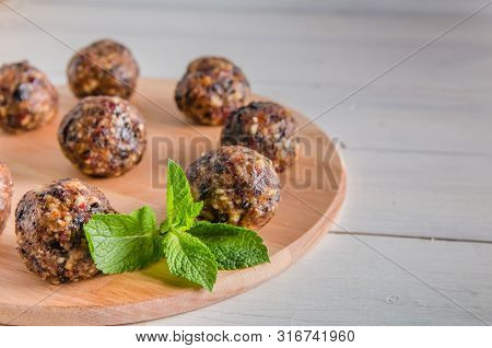 Vegetarian Food, Energy Balls Of Walnuts, Dates, Prunes, Cranberries And Honey