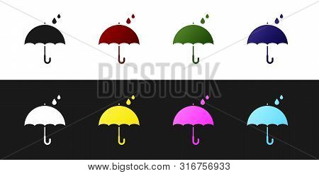 Set Umbrella And Rain Drops Icon Isolated On Black And White Background. Waterproof Icon. Protection