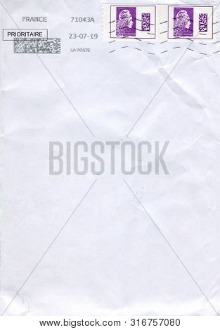 GOMEL, BELARUS - AUGUST 07, 2019: Old envelope which was dispatched from France to Gomel, Belarus, August 07, 2019.