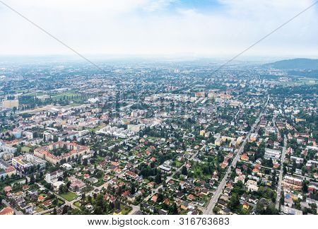 Aerial View Of City Graz From Helicopter Drone With District Eggenberg On A Cloudy Summer Day In Aus