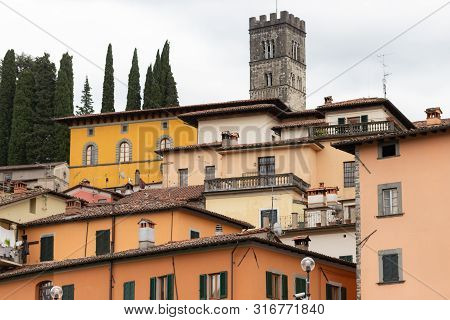 The Town Of Barga. Italy. Summer 2019. Old Houses On A Hill With A Tower. Houses Growing Ledges.