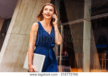 Young Eastern European American Woman Talking On Cell Phone, Traveling, Working In New York City, We