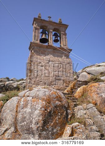 Picturesque Bell Tower Of The Parish Of Santa Maria In Muxia. August 7, 2012. Muxia La Coruna Galici