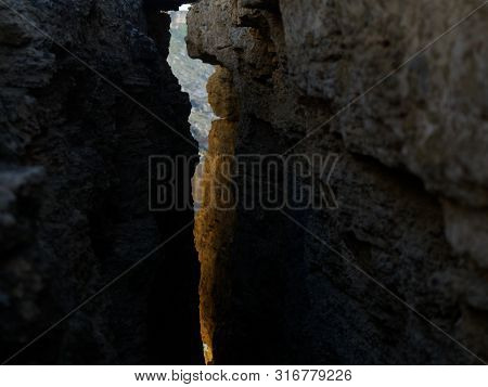 Cracked Rock Near The Caspian Sea.  
Mangyshlak Peninsula. Kazakhstan 2019. Expedition Site Tourist.