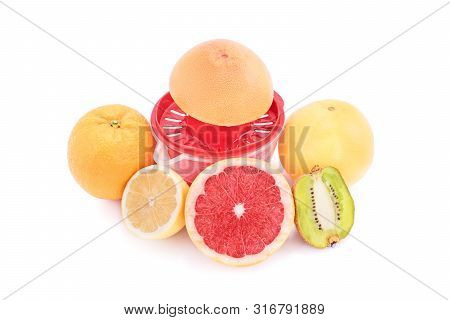 Squeezer And Different Fruits, Isolated On White Background. Orange, Grapefruit, Lemon And Kiwi With