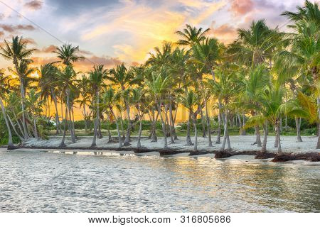 Sunset over Anse Champagne beach in Saint Francois, Guadeloupe, Caribbean