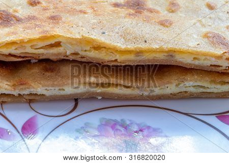Egg Paratha With Dalia Or Daliya, Cereal Food Know As Bulgur Cooked In Milk Served With Egg Stuffed 