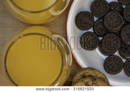 Rich, But A Lot Of Sugar On This Table Of Sweets And Natural Orange Juice