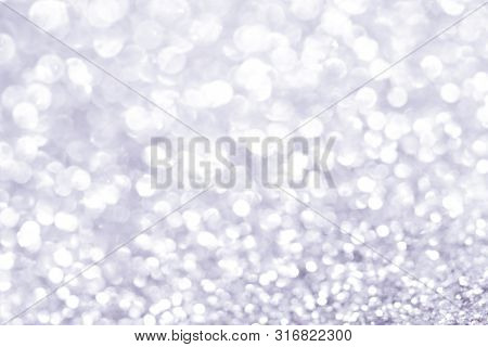 Sillver Bokeh Texture. Festive Glitter Background With Defocused Lights