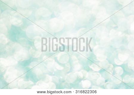 Blue Bokeh Texture. Festive Glitter Background With Defocused Lights