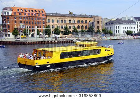 Copenhagen, Denmark - July 20, 2019: Yellow Public City Harbour Bus In The City Of Copenhagen.