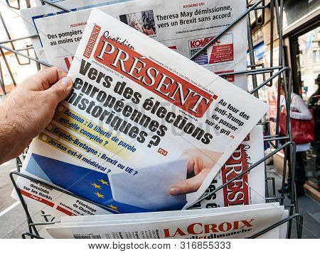 Strasbourg, France - May 25, 2019: Pov Reading At Press Kiosk Quotidien Present Newspaper Featuring 