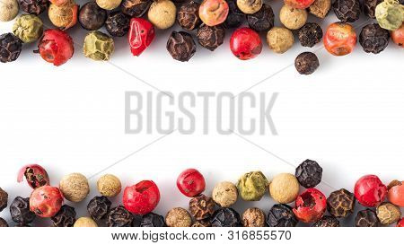 Mixed Peppercorns Background With White Copy Space In Center. Food Background With Peppercorns. Diff
