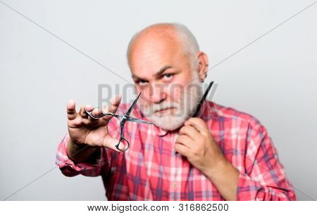 Making His Beard Perfect. Barbershop Concept. Shaving Accessories. Shaving Scissors Tool Kit. Unshav