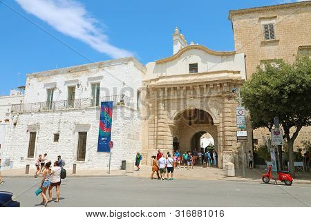 Polignano A Mare, Italy - July 28, 2019: Arco Marchesale Gate Of Old Town In Polignano A Mare, Italy
