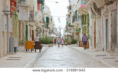 Polignano A Mare, Italy - July 28, 2019: View Of Street In Polignano A Mare, Italy