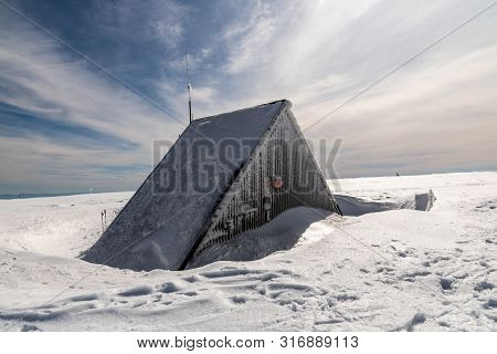 Vysoka Hole Hill In Winter Jeseniky Mountains In Czech Republic With Hut, Snow And Blue Sky With Clo