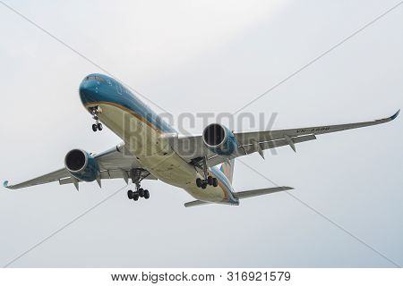 Passenger Airplane Landing At Saigon Airport