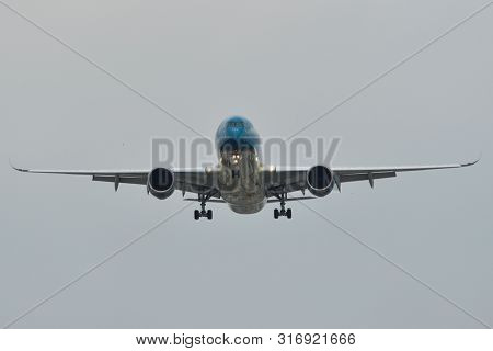 Passenger Airplane Landing At Saigon Airport