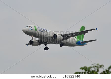 Passenger Airplane Landing At Saigon Airport