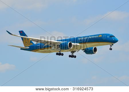 Passenger Airplane Landing At Saigon Airport
