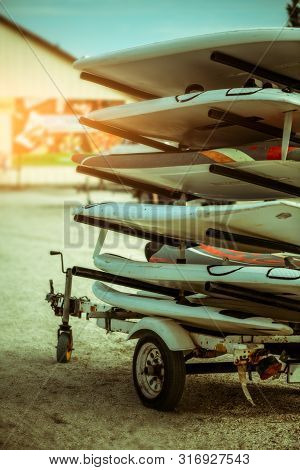 Outdoor Mobile Stand With Surf Surfboards And Windsurfing For Beginners In School