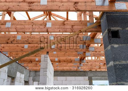Roof Trusses Not Covered With Ceramic Tile On A Detached House Under Construction, Visible Roof Elem
