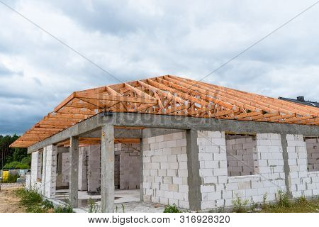 Roof Trusses Not Covered With Ceramic Tile On A Detached House Under Construction, Visible Roof Elem