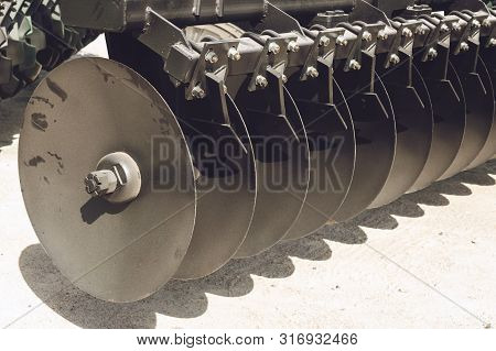 Working Parts Of New Agricultural Disc Harrow. Plow. Harrow. Cultivator For Cultivating The Earth.