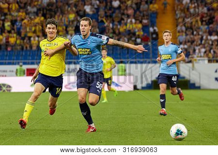 Rostov-on-don, Russia - August 12, 2019: Eldor Shomurodov Battle For The Ball With Maksim Karpovduri