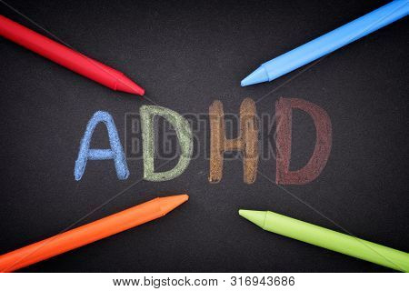 Adhd. Abbreviation Adhd On Black Background. Close Up. Adhd Is Attention Deficit Hyperactivity Disor