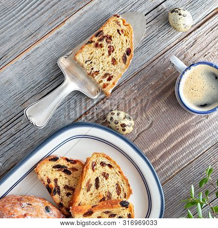 Easter Bread (osterbrot In German). Square Composition, Top View Of Traditional Fruity Bread On Rust