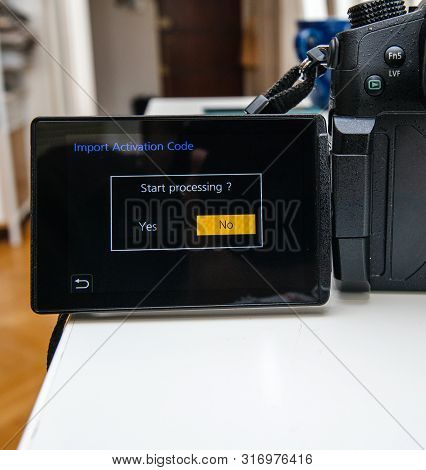 Paris, France - 27 Apr 2019: Start Processing Yes And No Button During Import Of Activation Code Pan