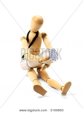 Dřevěný manekýn a baterka