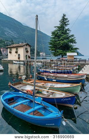 Torbole, Italy - July 25, 2019 : The Small Harbour Of Torbole On Lake Garda