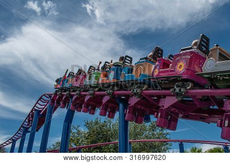Orlando, Florida. August 07, 2019. People Enjoying Super Grovers Box Car Derby. It Is A Family Frien