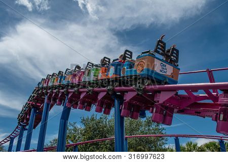 Orlando, Florida. August 07, 2019. People Enjoying Super Grovers Box Car Derby. It Is A Family Frien