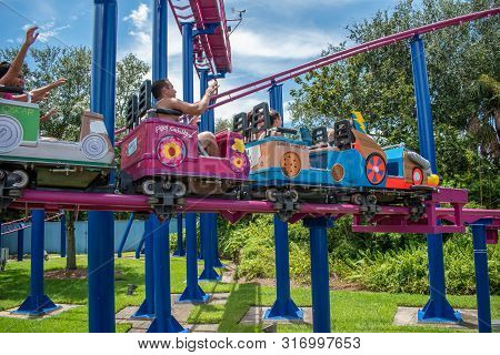 Orlando, Florida. August 07, 2019. People Enjoying Super Grovers Box Car Derby. It Is A Family Frien