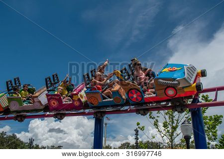 Orlando, Florida. August 07, 2019. People Enjoying Super Grovers Box Car Derby. It Is A Family Frien