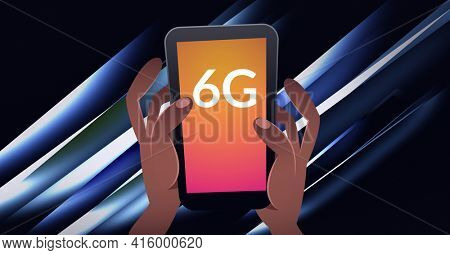 Composition of the word 6g over peson holding a smartphone with blue and whte shapes in background. global technology, digital interface, connection and communication concept digitally generated image