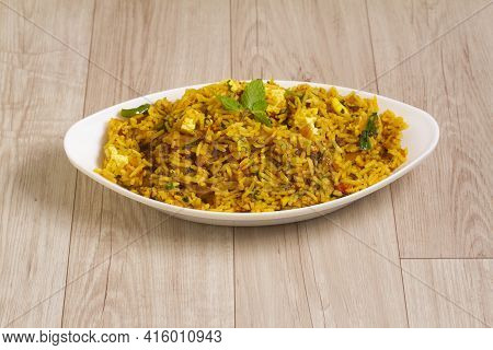 Indian Cuisine Kadhi - Vegetarian Curry Made Of Buttermilk And Chick Pea Flour. Served In A Bowl Or 