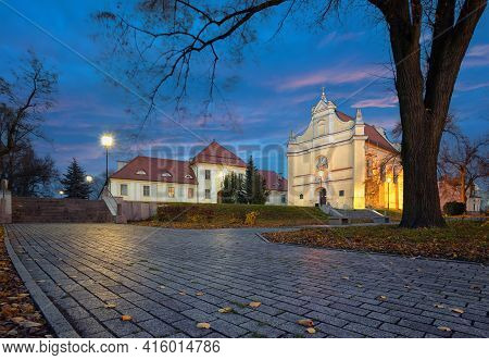 Gniezno, Poland. View Of St. George's Church (kosciol Sw. Jerzego) At Dusk - One Of The Oldest Churc