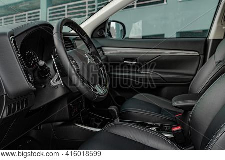 Moscow, Russia - January 30, 2021 Mitsubishi Outlander Dark Interior Close Up View. Third Generation
