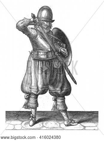The exercise with shield and spear: the soldier puts his rapier back in the sheath, vintage engraving.