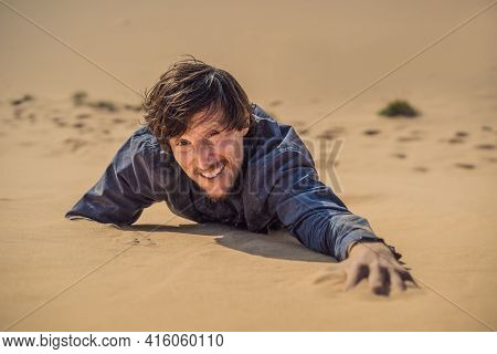 The Person Overcomes Difficulties And Aspires To The Purpose And Dream. A Man Overcomes Difficulties